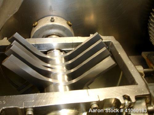 Used Fitzpatrick Fitzmill, Model DASO6. Stainless steel constuction, fixed blades, pan feed with 7.5 hp 230/460 volt, on legs, serial #9289.