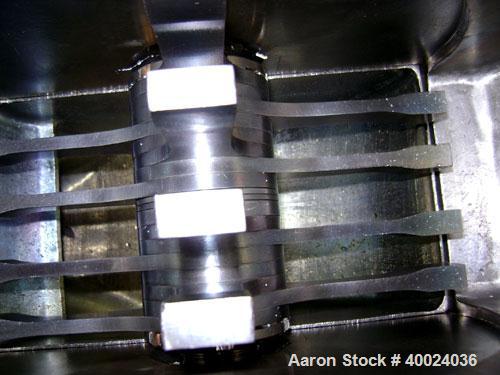 Used Fitzpatrick Fitzmill, Model DASO6, stainless steel. (16) double impact fixed blades, driven by an approximatetly 7.5hp XP motor, 4" diameter x 18" long screw feed, driven by an approximately 1/4...