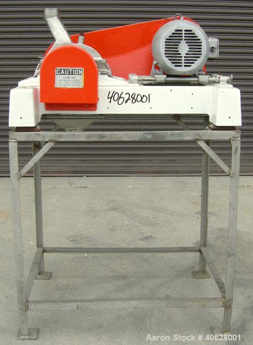Used Fitzpatrick Fitzmill, Model DASO6, 316 stainless steel. 16 fixed double impact 410 stainless steel blades. 6" x 11" cutting chamber, gravity feed throat with a 2 7/8" tri clamp opening, no botto...