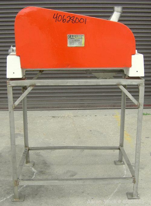 Used Fitzpatrick Fitzmill, Model DASO6, 316 stainless steel. 16 fixed double impact 410 stainless steel blades. 6" x 11" cutting chamber, gravity feed throat with a 2 7/8" tri clamp opening, no botto...