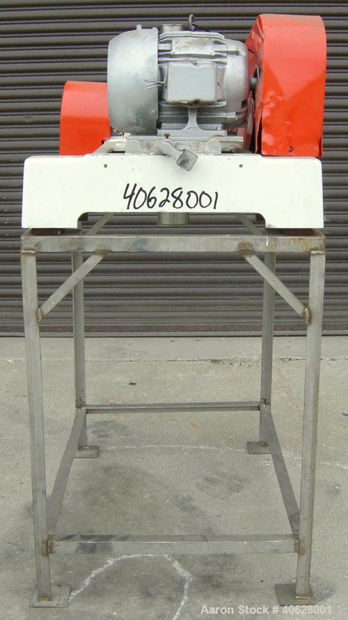 Used Fitzpatrick Fitzmill, Model DASO6, 316 stainless steel. 16 fixed double impact 410 stainless steel blades. 6" x 11" cutting chamber, gravity feed throat with a 2 7/8" tri clamp opening, no botto...