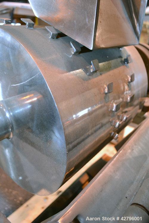 Used Fitzpatrick GuiloRiver, Model 14LX14D, 304 Stainless Steel. 14 Diameter x 14 wide rotor with riving pins. Hinged cover with pelican feed hopper, hinged bottom discharge. Driven by a 5hp, 3/60/20...