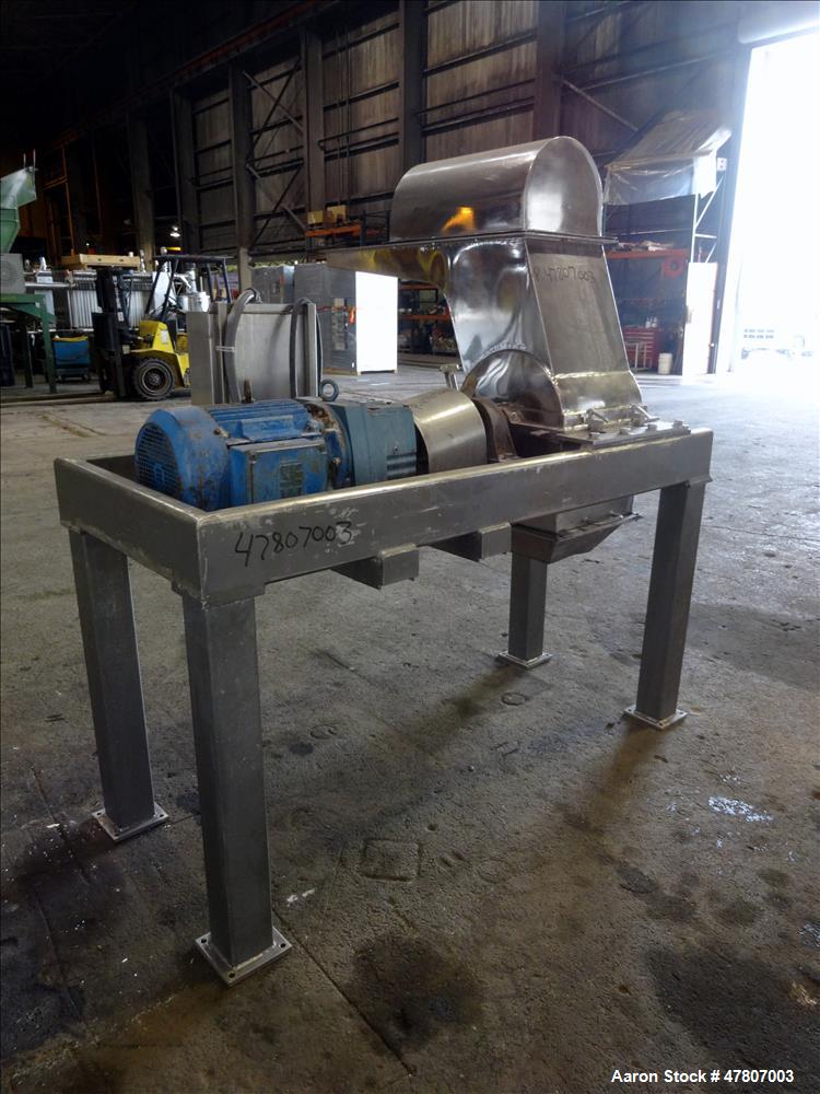 Used Fitzpatrick GuiloRiver, Model 14LX14D, 304 Stainless Steel. 14" Diameter x 14" wide rotor with riving pins. 16" x 15" Feed with a hinged pelican feed hopper, hinged bottom discharge with approxi...