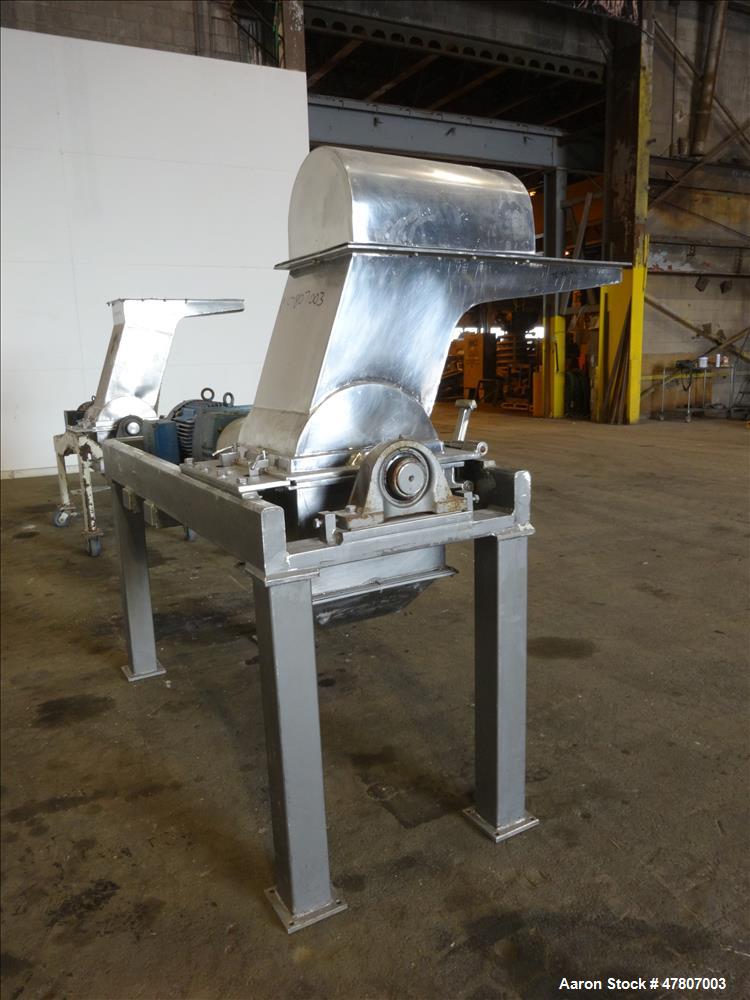 Used Fitzpatrick GuiloRiver, Model 14LX14D, 304 Stainless Steel. 14" Diameter x 14" wide rotor with riving pins. 16" x 15" Feed with a hinged pelican feed hopper, hinged bottom discharge with approxi...