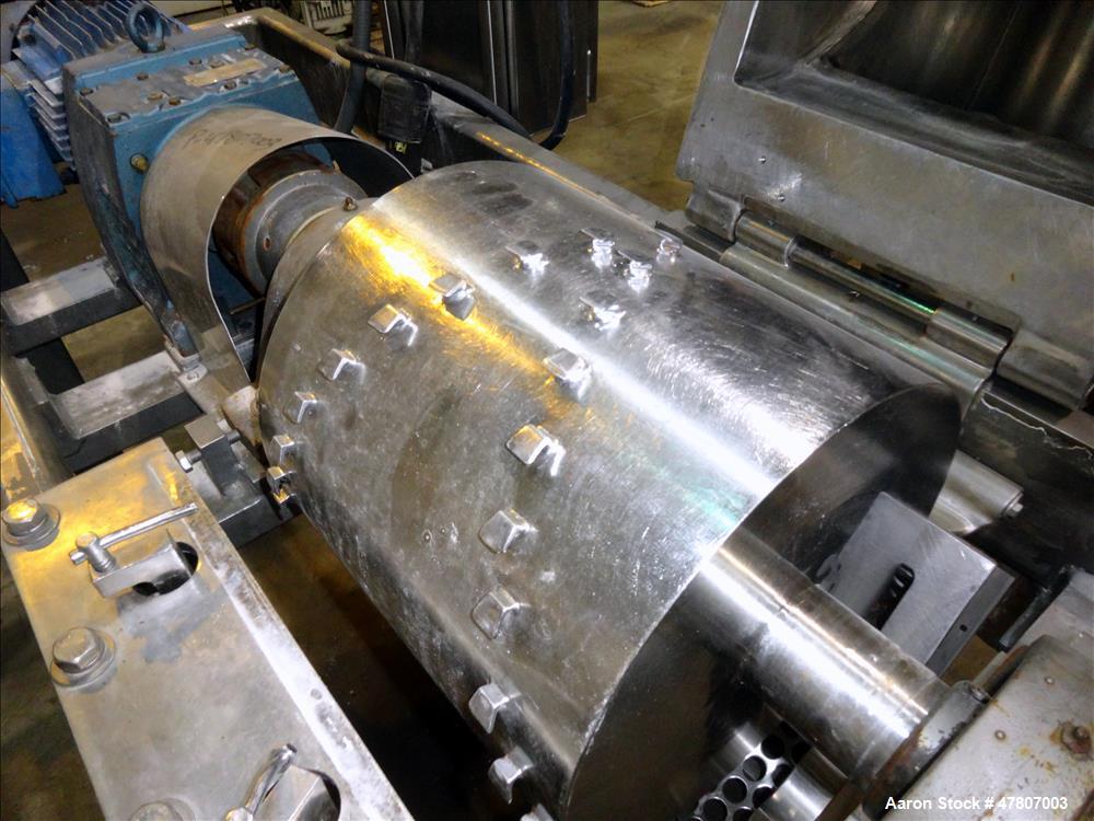 Used Fitzpatrick GuiloRiver, Model 14LX14D, 304 Stainless Steel. 14" Diameter x 14" wide rotor with riving pins. 16" x 15" Feed with a hinged pelican feed hopper, hinged bottom discharge with approxi...
