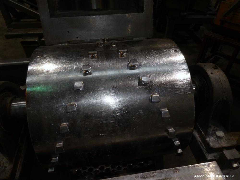 Used Fitzpatrick GuiloRiver, Model 14LX14D, 304 Stainless Steel. 14" Diameter x 14" wide rotor with riving pins. 16" x 15" Feed with a hinged pelican feed hopper, hinged bottom discharge with approxi...