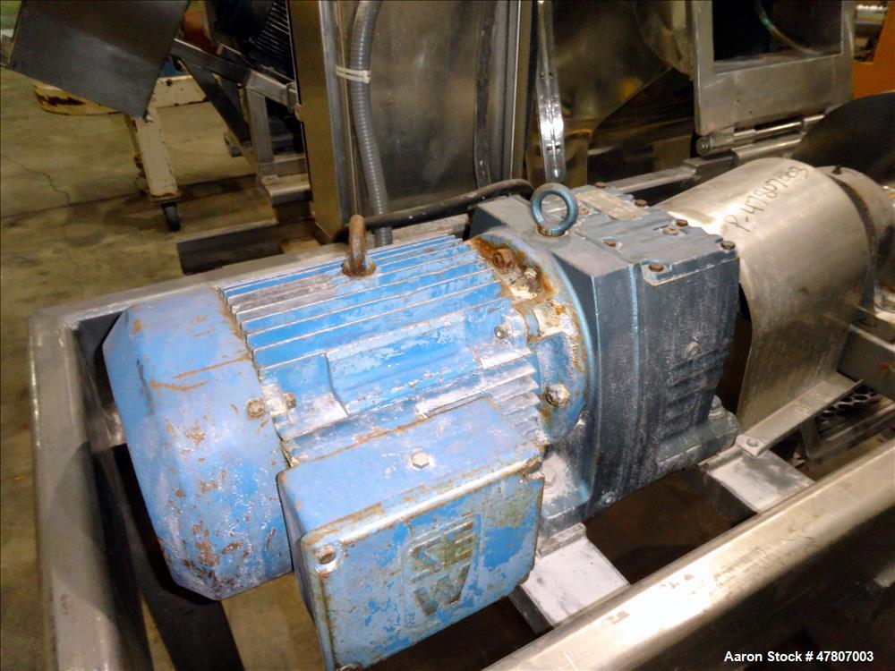Used Fitzpatrick GuiloRiver, Model 14LX14D, 304 Stainless Steel. 14" Diameter x 14" wide rotor with riving pins. 16" x 15" Feed with a hinged pelican feed hopper, hinged bottom discharge with approxi...