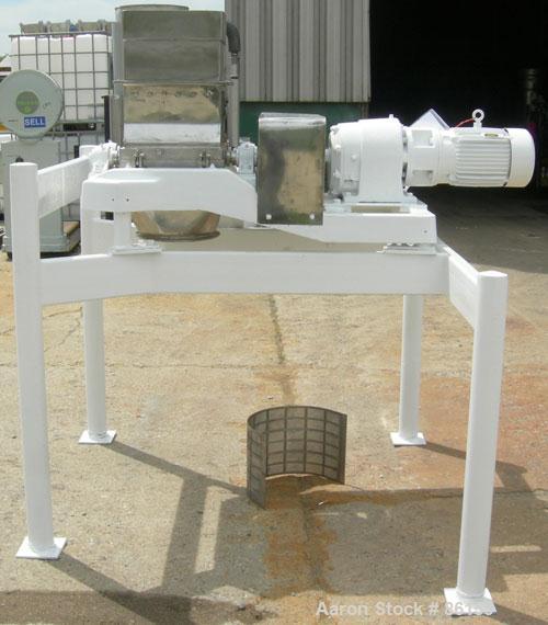 USED: Fitzpatrick Guilo-River, model 6D-12L, stainless steel. (2) 6" diameter x 12" long rotors with pins. Gravity style feed throat, bottom discharge. Driven by an approximate 5 hp gearmotor. Mounte...