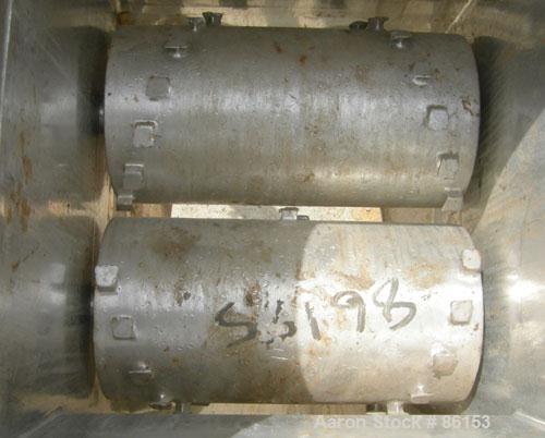 USED: Fitzpatrick Guilo-River, model 6D-12L, stainless steel. (2) 6" diameter x 12" long rotors with pins. Gravity style feed throat, bottom discharge. Driven by an approximate 5 hp gearmotor. Mounte...