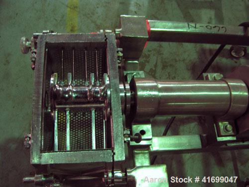 Used Fitzpatrick Fitzmill, modelD6A, stainless steel. Pan feed, fixed blades. Driven by a 5 hp, 230/460 volt motor. Mounted on a stainless steel base with casters.
