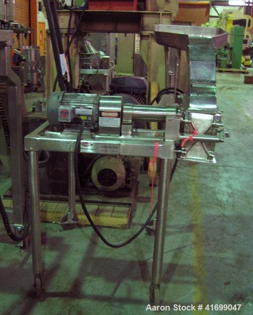 Used Fitzpatrick Fitzmill, modelD6A, stainless steel. Pan feed, fixed blades. Driven by a 5 hp, 230/460 volt motor. Mounted on a stainless steel base with casters.