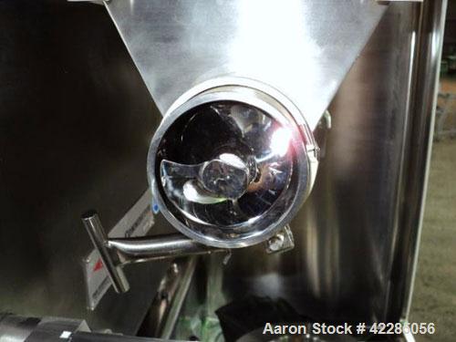 Unused- Fitzpatrick Fitzmill, Model D6A, 316 Stainless Steel. 25RA Mirror polish internal, screw feed with hopper, driven by .5 hp variable speed drive, 5 hp variable speed main drive. Unit is mounte...