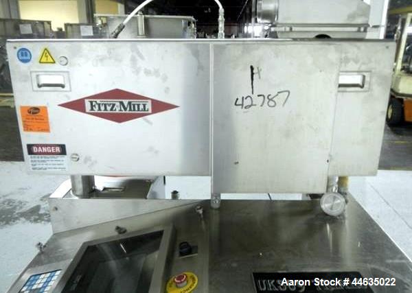 Used Fitzpatrick Fitzmill, Model D6A. 316 Stainless steel product contact surfaces, 304 stainless steel non product contact surfaces, cantilevered design, mirror internal finish, fixed blades with 7....