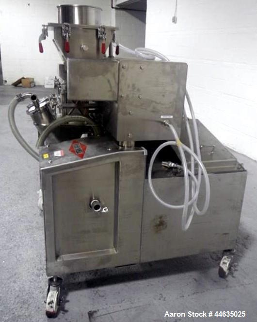 Used Fitzpatrick Fitzmill, Model D6A. 316 Stainless steel product contact surfaces, 304 stainless steel non product contact surfaces, cantilevered design, mirror internal finish, fixed blades with dr...