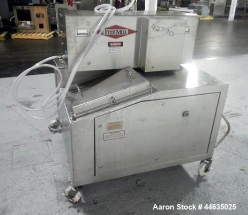 Used Fitzpatrick Fitzmill, Model D6A. 316 Stainless steel product contact surfaces, 304 stainless steel non product contact surfaces, cantilevered design, mirror internal finish, fixed blades with dr...