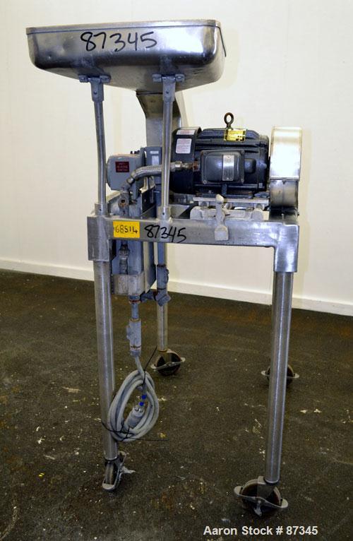 Used Fitzpatrick Fitzmill, Model D6A, 316 Stainless Steel. (16) Fixed knife/impact blades. 6" x 11" Cutting chamber, no bottom screen. Gravity feed throat with pan. Driven by a 5 hp, 3/60/230/460 vol...