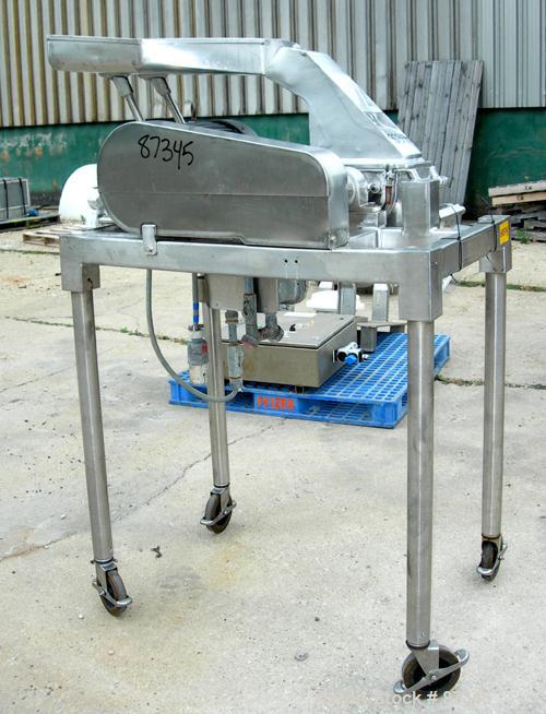 Used Fitzpatrick Fitzmill, Model D6A, 316 Stainless Steel. (16) Fixed knife/impact blades. 6" x 11" Cutting chamber, no bottom screen. Gravity feed throat with pan. Driven by a 5 hp, 3/60/230/460 vol...