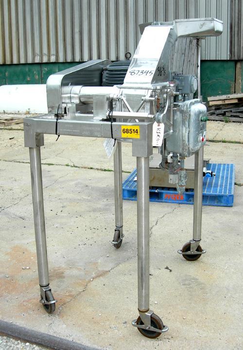 Used Fitzpatrick Fitzmill, Model D6A, 316 Stainless Steel. (16) Fixed knife/impact blades. 6" x 11" Cutting chamber, no bottom screen. Gravity feed throat with pan. Driven by a 5 hp, 3/60/230/460 vol...