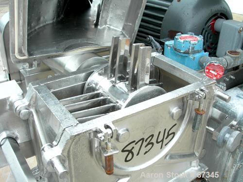 Used Fitzpatrick Fitzmill, Model D6A, 316 Stainless Steel. (16) Fixed knife/impact blades. 6" x 11" Cutting chamber, no bottom screen. Gravity feed throat with pan. Driven by a 5 hp, 3/60/230/460 vol...