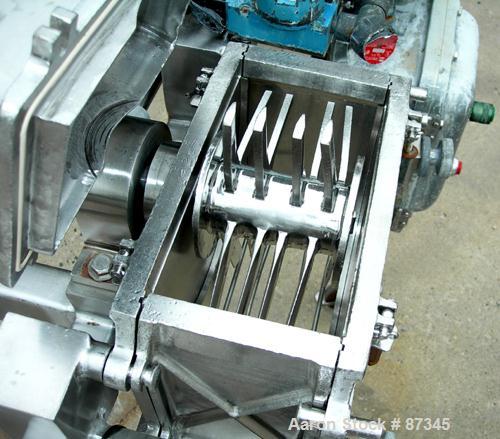 Used Fitzpatrick Fitzmill, Model D6A, 316 Stainless Steel. (16) Fixed knife/impact blades. 6" x 11" Cutting chamber, no bottom screen. Gravity feed throat with pan. Driven by a 5 hp, 3/60/230/460 vol...