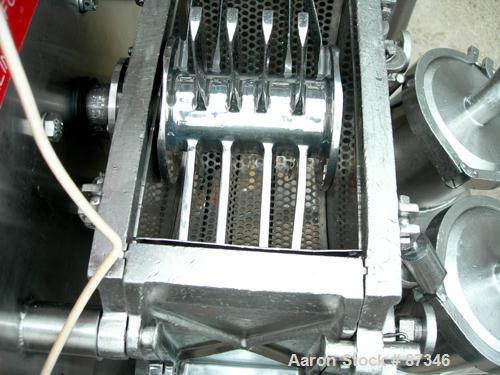 Used Fitzpatrick Fitzmill, Model D6A, 316 Stainless Steel. (16) Fixed knife/impact blades, 6" x 11" cutting chamber with bottom screen. 4" Diameter x 16" long screw feed with hopper, driven by a 1/4 ...