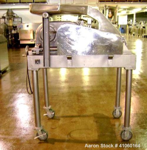 Used Fitzpatrick Fitzmill, Model D6, Stainless Steel. (16) Knife/impact swinging blades, reversible chamber, pan feed with 5 hp 220/440 volt motor on stands.