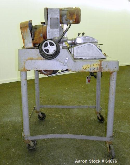 Used Fitzpatrick Fitzmill, Model D6, 316 Stainless Steel. 16 Double sided impact 410/16/20 stainless steel swinging blades, 6" x 11" cutting chamber, jacketed feed throat. 3" Diameter x 16" long scre...