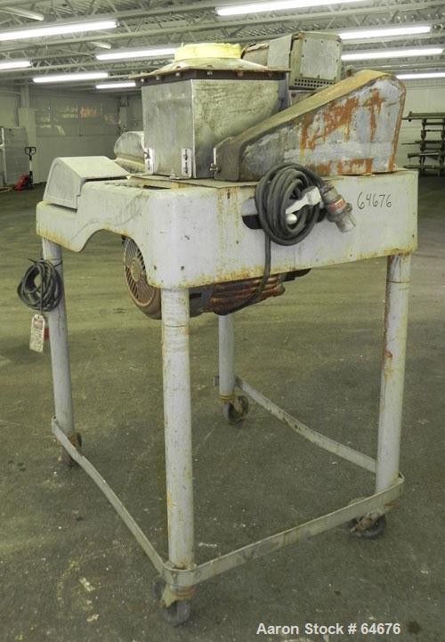 Used Fitzpatrick Fitzmill, Model D6, 316 Stainless Steel. 16 Double sided impact 410/16/20 stainless steel swinging blades, 6" x 11" cutting chamber, jacketed feed throat. 3" Diameter x 16" long scre...
