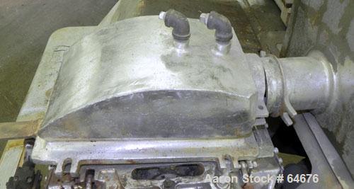 Used Fitzpatrick Fitzmill, Model D6, 316 Stainless Steel. 16 Double sided impact 410/16/20 stainless steel swinging blades, 6" x 11" cutting chamber, jacketed feed throat. 3" Diameter x 16" long scre...