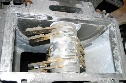 Used Fitzpatrick Fitzmill, Model D6, 316 Stainless Steel. 16 Double sided impact 410/16/20 stainless steel swinging blades, 6" x 11" cutting chamber, jacketed feed throat. 3" Diameter x 16" long scre...