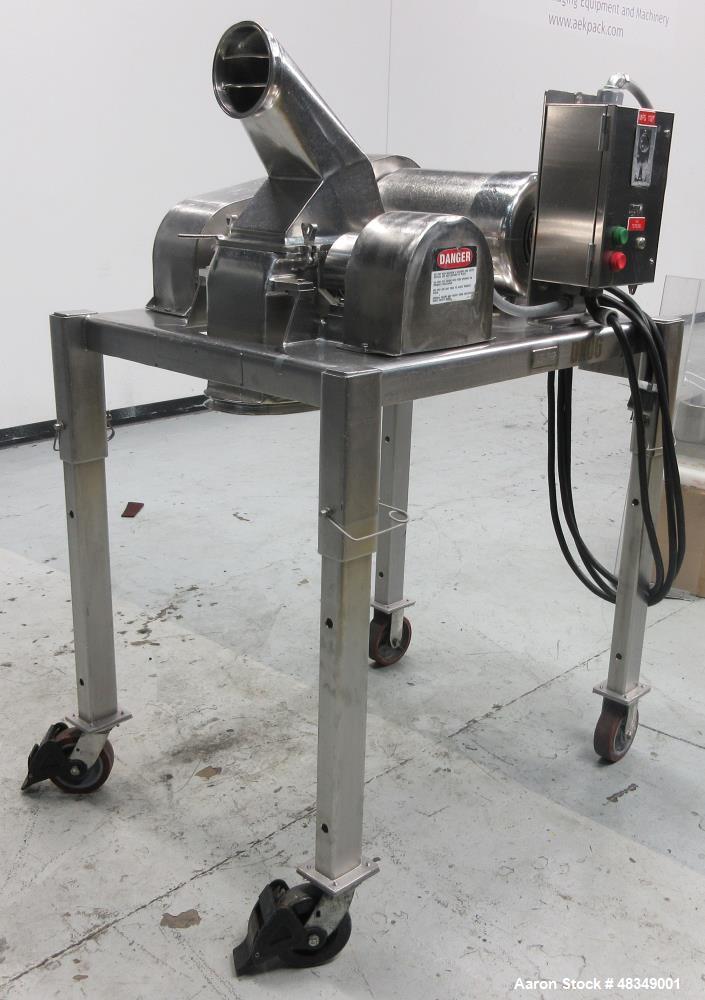 Used Fitzpatrick FitzMill, Model DA-06, 316 Stainless Steel. (16) Swinging Blade with double impact knife/blades, 410 stainless steel. 6" x 11" cutting chamber, with cover and top feed, no bottom scr...