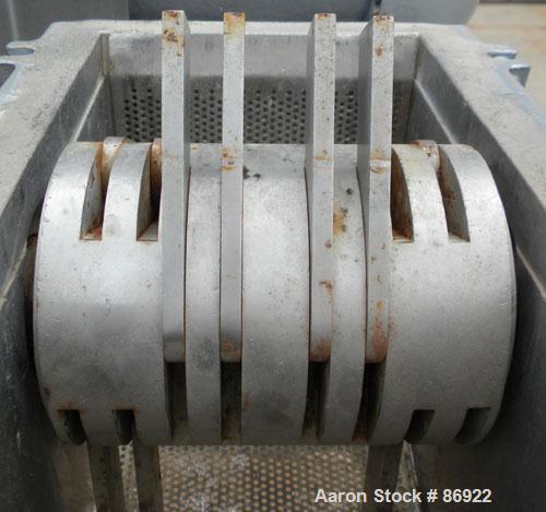 Used Fitzpatrick Fitzmill, Model DAO6, 316 Stainless Steel. (16) double impact swinging blades, 6" x 11" cutting chamber, bottom screen. 304 stainless steel gravity feed throat. Driven by a 7.5 HP, 3...