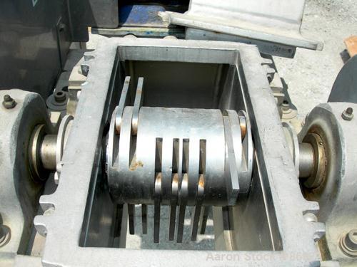 Used Fitzpatrick Fitzmill, Model DAO6, 316 Stainless Steel. (16) double impact swinging blades, 6" x 11" cutting chamber, bottom screen. 304 stainless steel gravity feed throat. Driven by a 7.5 HP, 3...