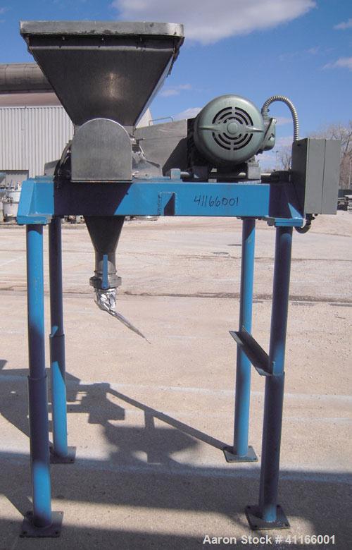 Used Fitzpatrick Fitzmill, Model DASO6 , 316 stainless steel. 11 1/4" x 6 1/4" chamber, (16) bolt on 15-5 PH single edge blades.  Top gravity feed with hopper. Driven by a 15 hp, 3/60/230/460 volt, 3...