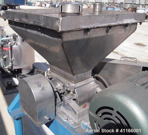Used Fitzpatrick Fitzmill, Model DASO6 , 316 stainless steel. 11 1/4" x 6 1/4" chamber, (16) bolt on 15-5 PH single edge blades.  Top gravity feed with hopper. Driven by a 15 hp, 3/60/230/460 volt, 3...