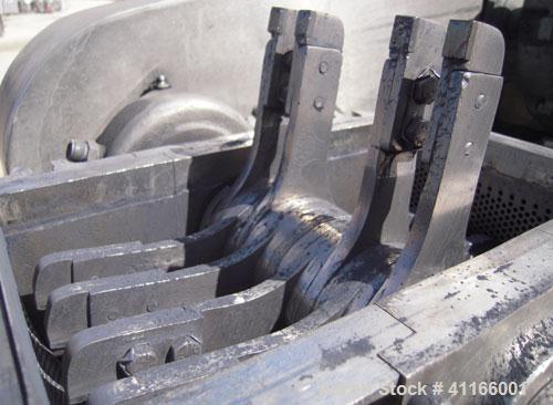 Used Fitzpatrick Fitzmill, Model DASO6 , 316 stainless steel. 11 1/4" x 6 1/4" chamber, (16) bolt on 15-5 PH single edge blades.  Top gravity feed with hopper. Driven by a 15 hp, 3/60/230/460 volt, 3...