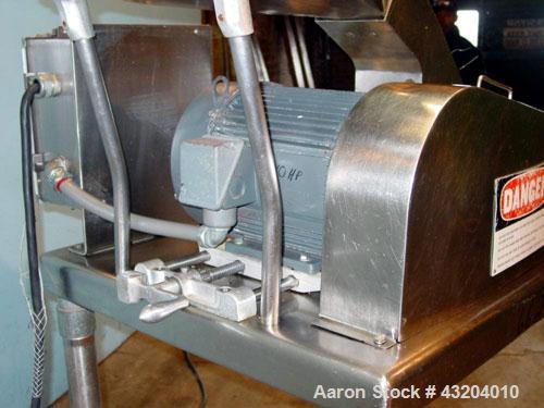 Used Fitzpatrick Fitzmill, Model DASO6, Stainless Steel. (16) Fixed impact/knife blades. 6" x 11" Cutting chamber, gravity feed throat with pan. No bottom screen. Driven by a 10 hp motor. Mounted on ...