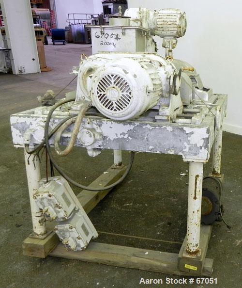 Used Fitzpatrick Fitzmill, Model DASO6, 304 Stainless Steel. 16 Double sided fixed knife 410/16/20 stainless steel blades, 6" x 11" cutting chamber, 3" diameter x 16" long screw feed, 12" x 12" x 12"...
