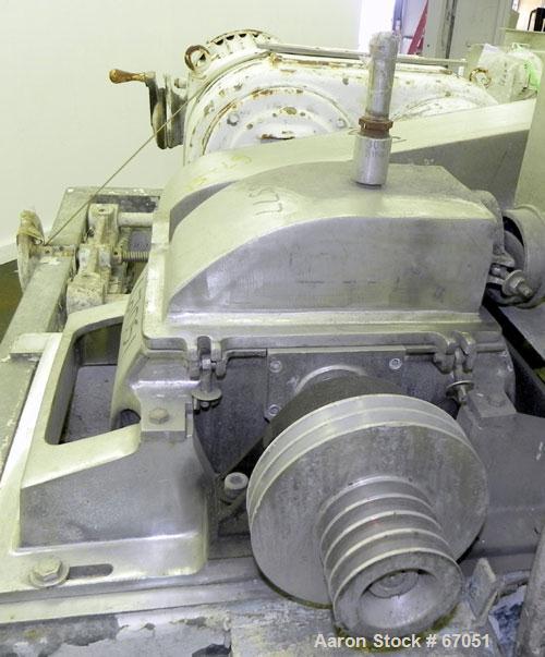 Used Fitzpatrick Fitzmill, Model DASO6, 304 Stainless Steel. 16 Double sided fixed knife 410/16/20 stainless steel blades, 6" x 11" cutting chamber, 3" diameter x 16" long screw feed, 12" x 12" x 12"...