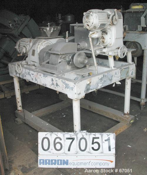 Used Fitzpatrick Fitzmill, Model DASO6, 304 Stainless Steel. 16 Double sided fixed knife 410/16/20 stainless steel blades, 6" x 11" cutting chamber, 3" diameter x 16" long screw feed, 12" x 12" x 12"...