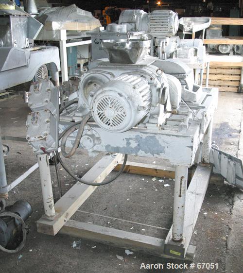 Used Fitzpatrick Fitzmill, Model DASO6, 304 Stainless Steel. 16 Double sided fixed knife 410/16/20 stainless steel blades, 6" x 11" cutting chamber, 3" diameter x 16" long screw feed, 12" x 12" x 12"...
