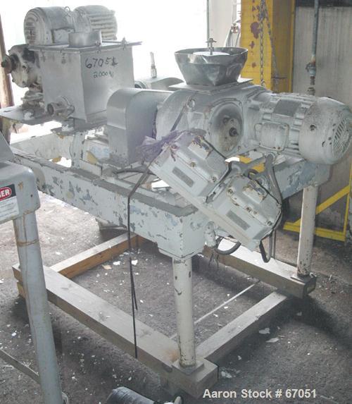 Used Fitzpatrick Fitzmill, Model DASO6, 304 Stainless Steel. 16 Double sided fixed knife 410/16/20 stainless steel blades, 6" x 11" cutting chamber, 3" diameter x 16" long screw feed, 12" x 12" x 12"...