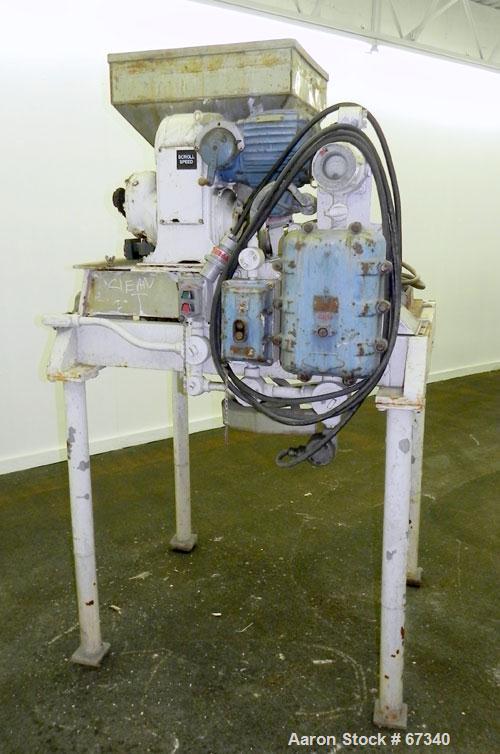 Used Fitzpatrick Fitzmill, Model DASO6, 316 Stainless Steel. (16) Knife rotor with code 575 fixed knife/impact 410/16/20 stainless steel blades. 6" x 11" Water cooled cutting chamber, 3" diameter x 1...
