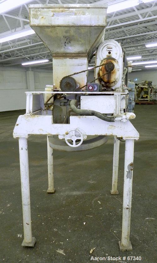 Used Fitzpatrick Fitzmill, Model DASO6, 316 Stainless Steel. (16) Knife rotor with code 575 fixed knife/impact 410/16/20 stainless steel blades. 6" x 11" Water cooled cutting chamber, 3" diameter x 1...