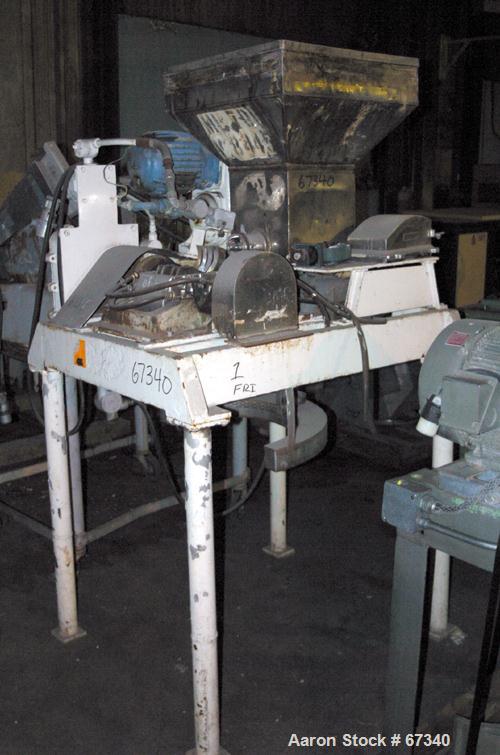 Used Fitzpatrick Fitzmill, Model DASO6, 316 Stainless Steel. (16) Knife rotor with code 575 fixed knife/impact 410/16/20 stainless steel blades. 6" x 11" Water cooled cutting chamber, 3" diameter x 1...