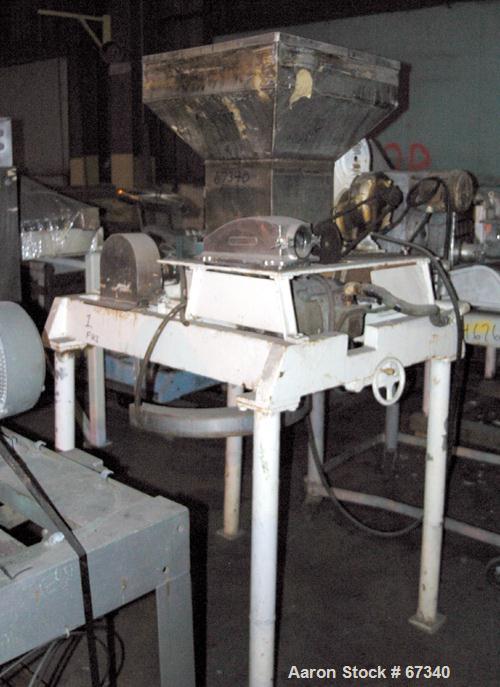 Used Fitzpatrick Fitzmill, Model DASO6, 316 Stainless Steel. (16) Knife rotor with code 575 fixed knife/impact 410/16/20 stainless steel blades. 6" x 11" Water cooled cutting chamber, 3" diameter x 1...