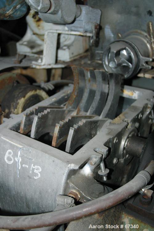 Used Fitzpatrick Fitzmill, Model DASO6, 316 Stainless Steel. (16) Knife rotor with code 575 fixed knife/impact 410/16/20 stainless steel blades. 6" x 11" Water cooled cutting chamber, 3" diameter x 1...