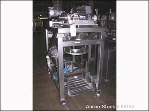 USED: Fitzmill, model DAS06, stainless steel. Fixed blades, screw fed top cover, driven by a 1/3 hp XP motor. Mill driven by a 10 hp, 230/460 volt motor. Mounted on a stainless steel frame. Includes ...