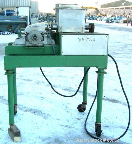 Used Fitzpatrick Fitzmill, Model DASO-12, 304 Stainless Steel. (32) fixed impact/knife blades. 13" x 11" cutting chamber, bottom screen. Driven by a 10 HP, 3/60/230/460 Volt, 3490 RPM motor. (2) 3" d...
