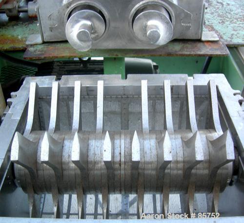 Used Fitzpatrick Fitzmill, Model DASO-12, 304 Stainless Steel. (32) fixed impact/knife blades. 13" x 11" cutting chamber, bottom screen. Driven by a 10 HP, 3/60/230/460 Volt, 3490 RPM motor. (2) 3" d...